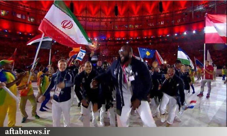 عکس/ اهتزاز پرچم ايران در مراسم اختتاميه