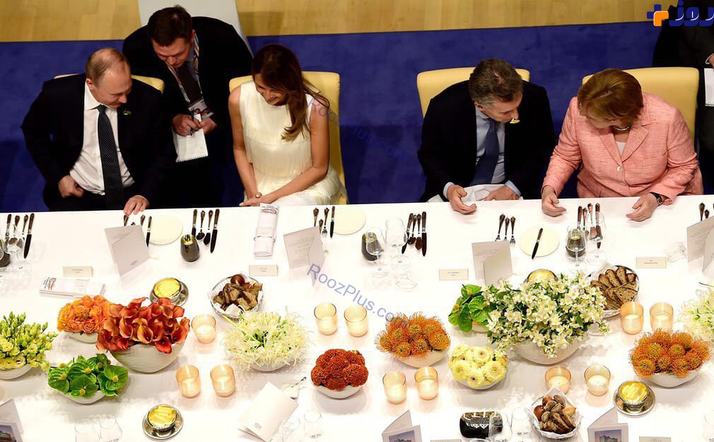 گفت و گوی پوتین با ملانیا همسر ترامپ در سر میز شام/عکس