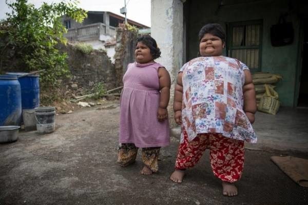 چاق ترین خواهران دنیا با گرسنگی وحشتناک! +عکس