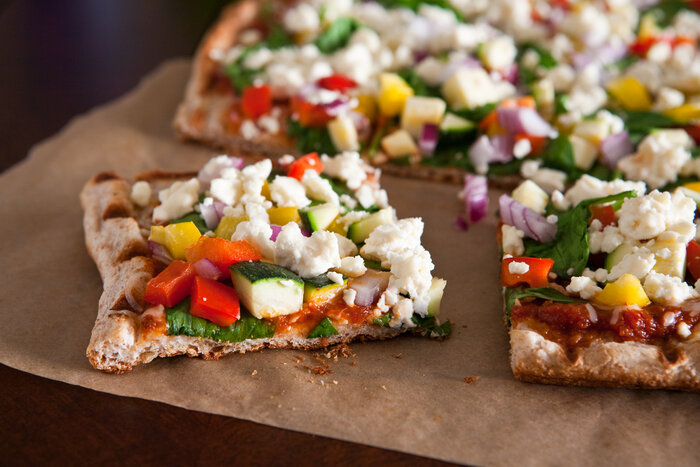 ۷ نکته برای خوشمزه‌تر شدن پیتزاهای خانگی