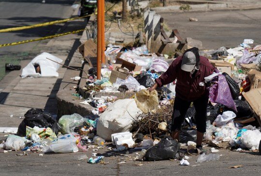 اجساد کرونایی کنار زباله‌دانی‌ها در بولیوی/عکس