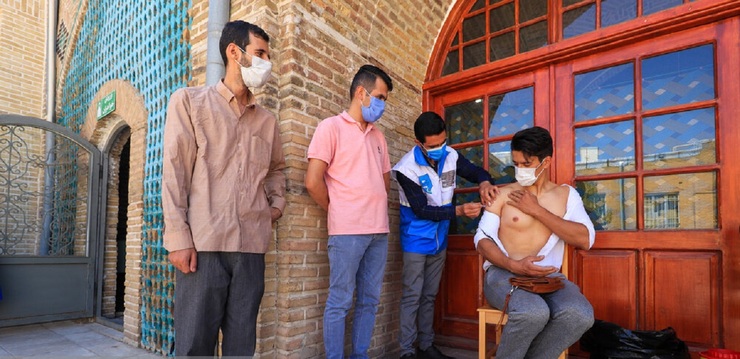 تصاویر| واکسیناسیون بازاریان در زنجان