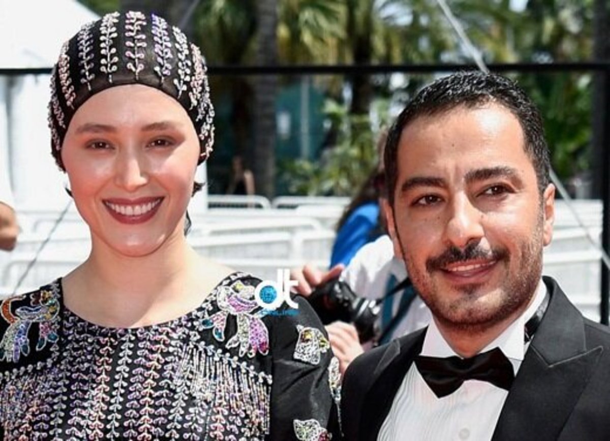 جنجال بوسه عاشقانه نوید محمدزاده و فرشته حسینی روی فرش قرمز کن