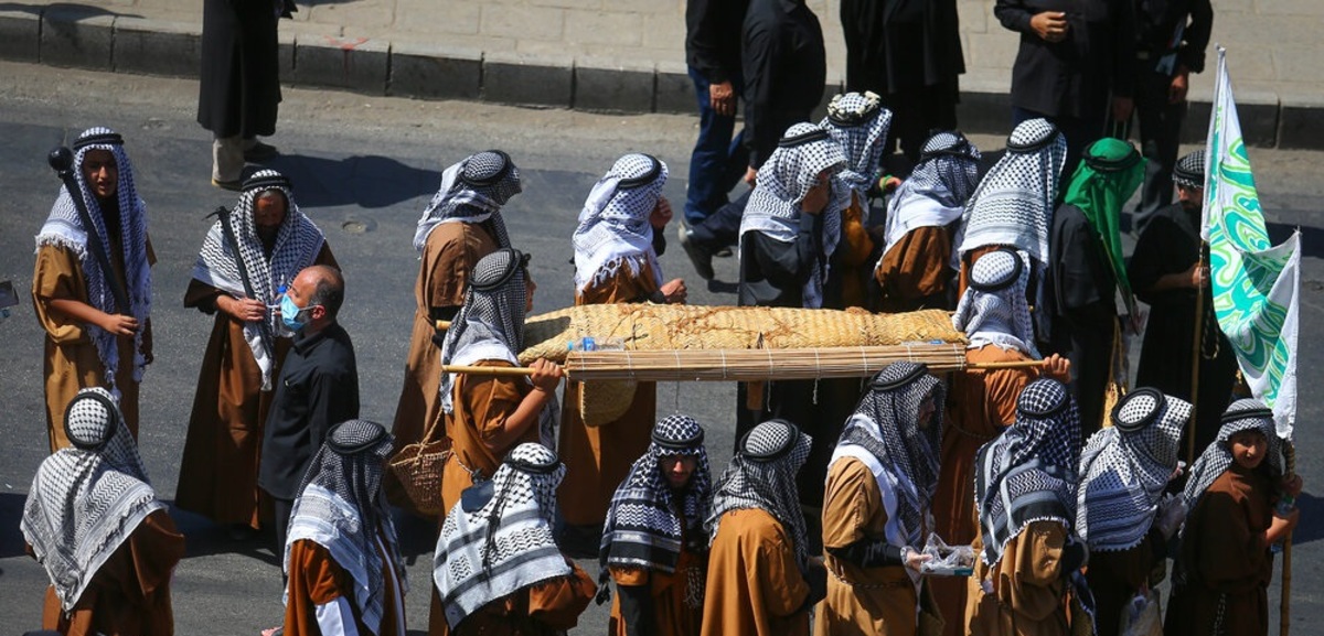 تصاویر| تشییع نمادین شهدای کربلا در همدان