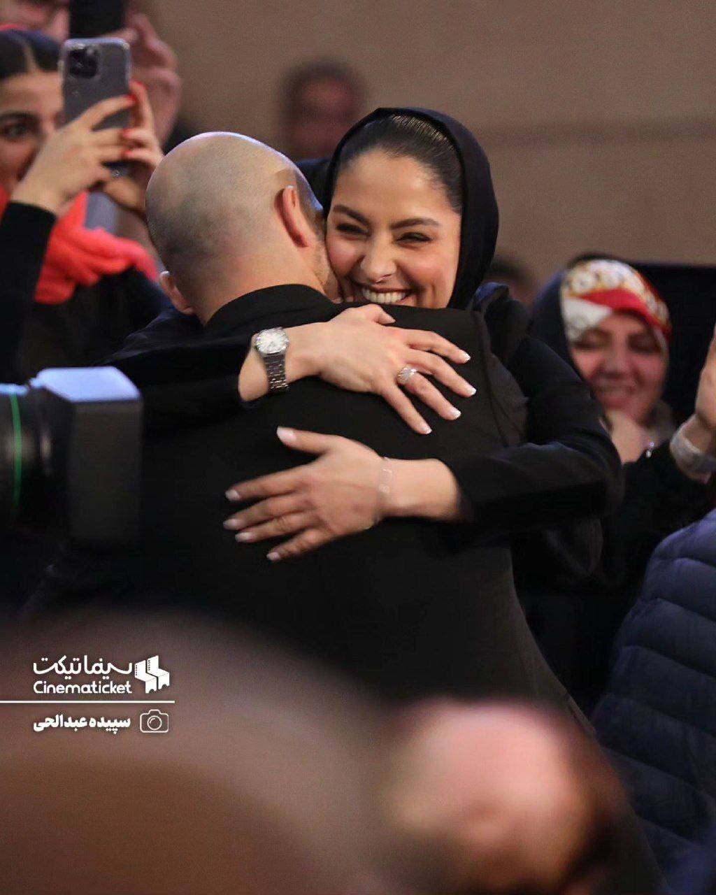 عکس| عاشقانه‌ترین صحنه شکار شده از جشنواره فجر