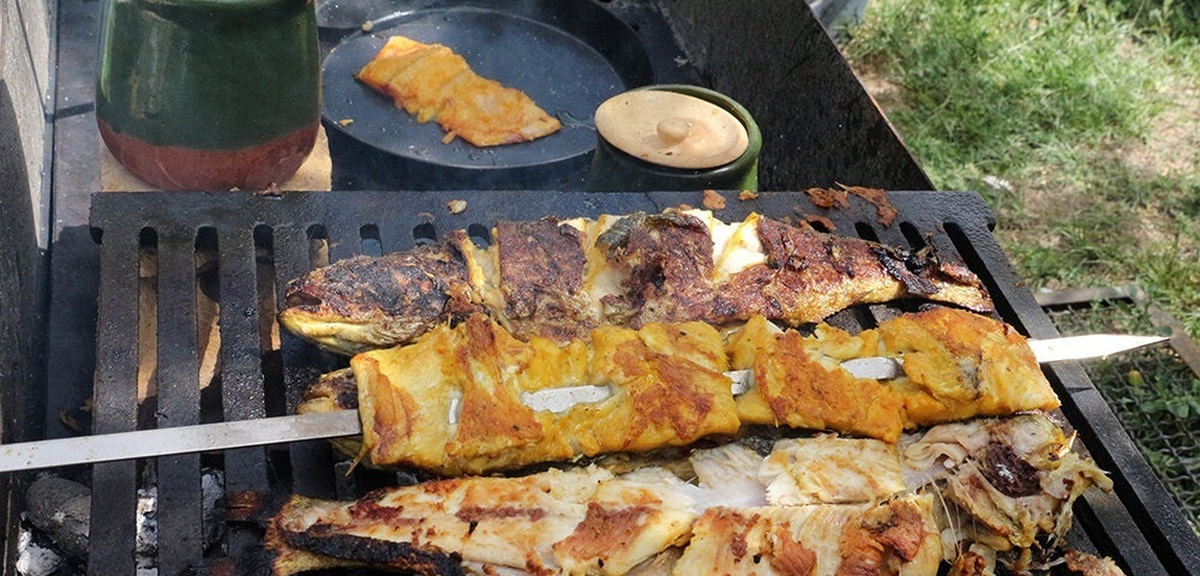 تصاویر| دومین جشنواره طبخ ماهی قزل‌آلا در شهر دندی
