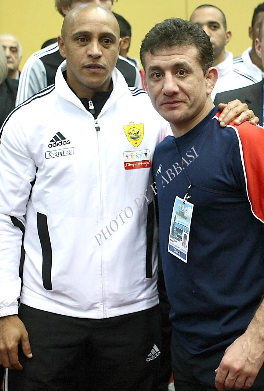 عکس‌| ملاقات سرمربی تیم ملی کشتی با اسطوره رئال مادرید