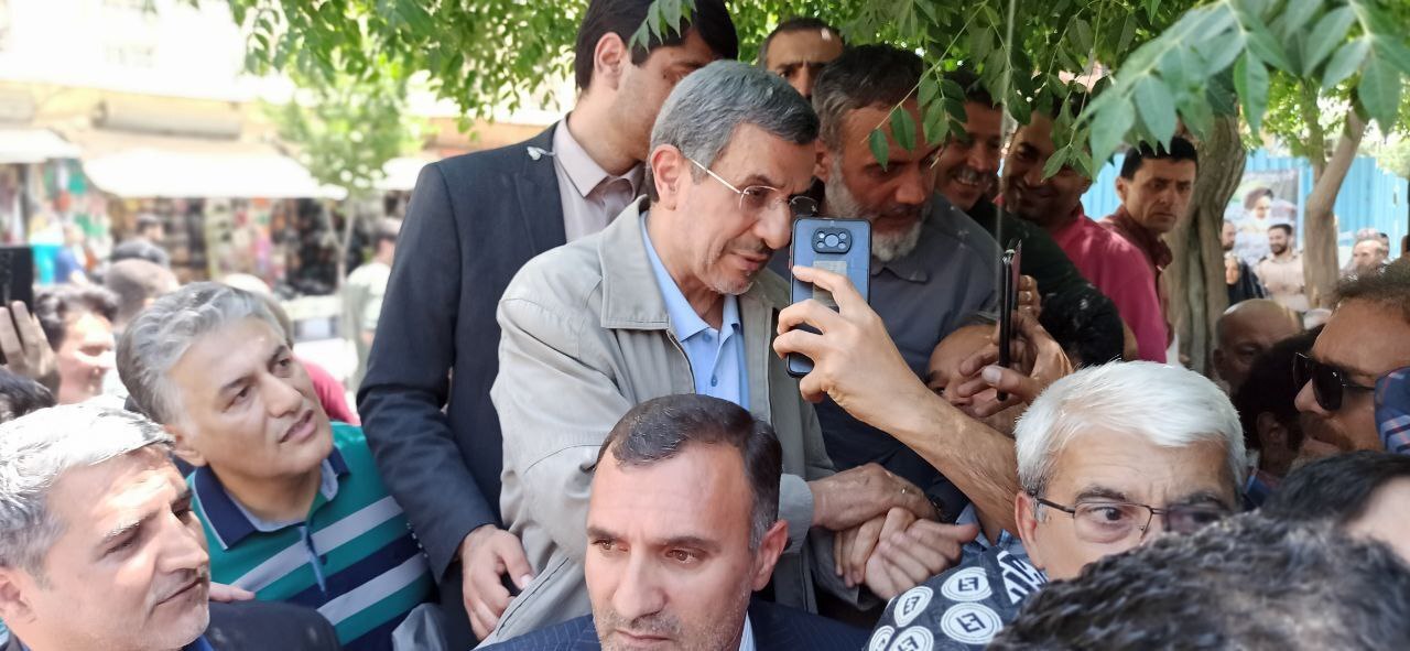 احمدی نژاد در بازار تهران محاصره شد + عکس