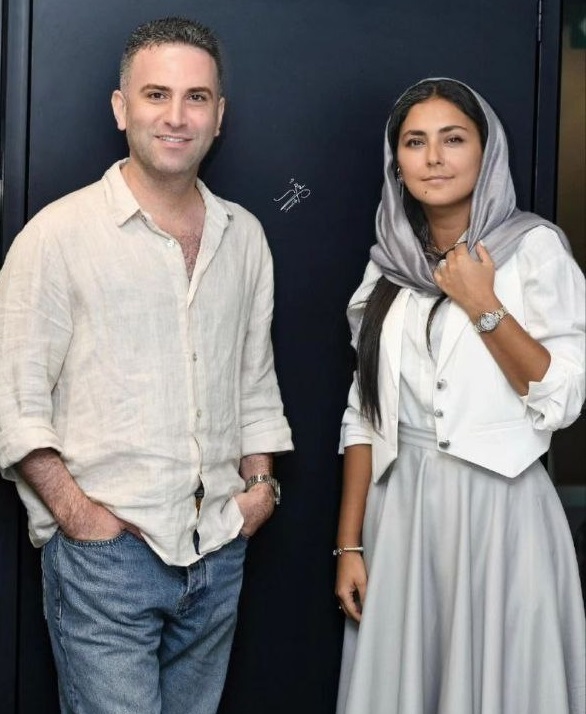 Hoda Zain al-Abidin in a skirt next to Hoten Shakiba