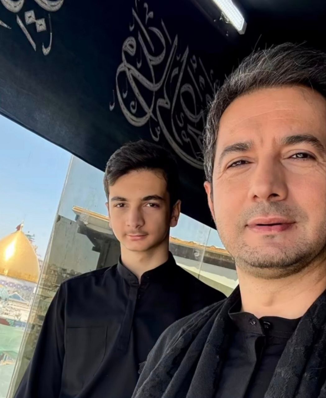 عکس/  نجم الدین شریعتی و پسرش در کربلا