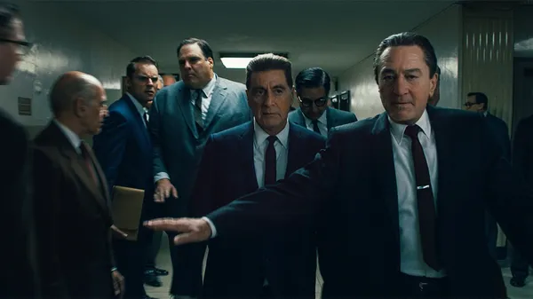 مرد ایرلندی | The Irishman

نمره منتقدان: ۹۴ از ۱۰۰

فیلم&zwnj;های گانگستری یکی از جذاب&zwnj;ترین انواع فیلم&zwnj;های درام هستند. چراکه با تلفیق یک داستان بی&zwnj;نظیر و مجموعه&zwnj;ای از صحنه&zwnj;های اکشن فراموش&zwnj;نشدنی، به خاطره&zwnj;ای به&zwnj;یادماندنی تبدیل می&zwnj;شوند. مارتین اسکورسیزی، کارگردان بی&zwnj;نظیر فیلم&zwnj;های گانگستری، در جدیدترین و یکی از طولانی&zwnj;ترین فیلم&zwnj;های سینمایی&zwnj;اش به دنیای خلافکار&zwnj;ها بازگشته است. او با کمک مجموعه&zwnj;ای از اسطوره&zwnj;های دنیای سینما داستان یک همکاری مجرمانه را روایت می&zwnj;کند. آل پاچینو، رابرت دنیرو و جو پشی سه بازیگر اصلی &laquo;مرد ایرلندی&raquo; برای هواداران سینما یادآور فیلم&zwnj;های درخشان بسیاری هستند.

خلاصه داستان: در دهه ۱۹۵۰، راننده کامیونی به نام فرانک شیرن (رابرت دنیرو) با راسل بوفالینو (جو پشی) از اعضای قدرتمند مافیا ارتباط می&zwnj;گیرد. شیران همزمان با همکاری با بوفالینو شروع به کار برای جیمی هوفا (آل پاچینو) می&zwnj;کند.