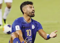 عکس/رامین رضاییان با استایلی جدید در راه عربستان