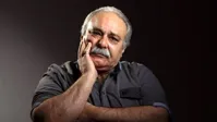 محمد کاسبی: با دستگاه اکسیژن، زندگی می‌کنم و از کمر به پایین توان حرکت ندارم!