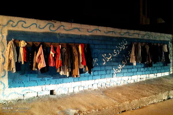 دیوار مهربانی در میانه
